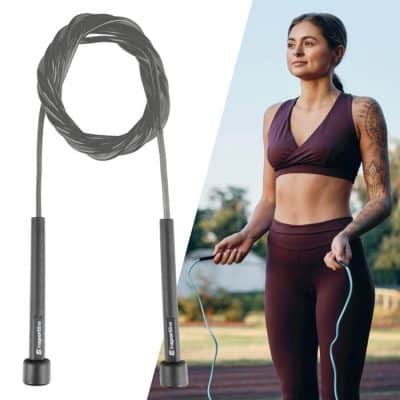Smiling young happy sports woman make sport exercises